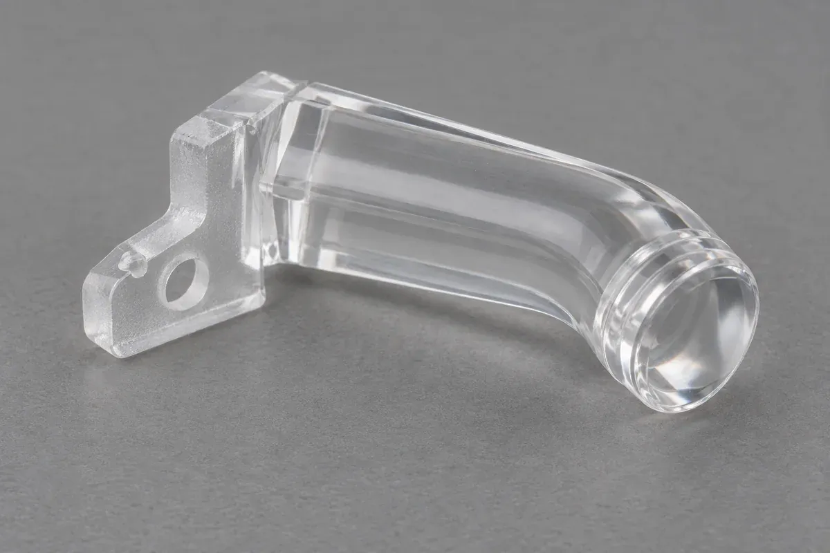 Clear light pipe with a separate mounting flange and a small molding witness