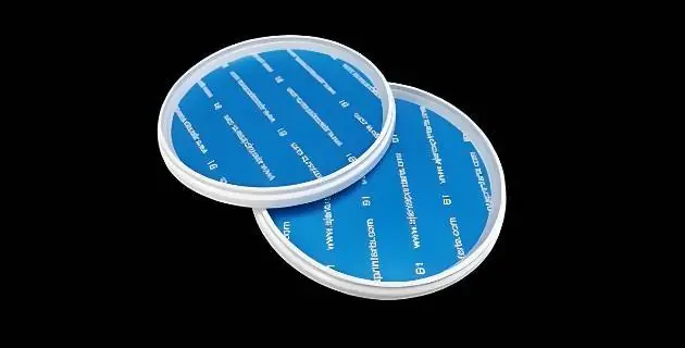 Label and part made as one in a single cycle