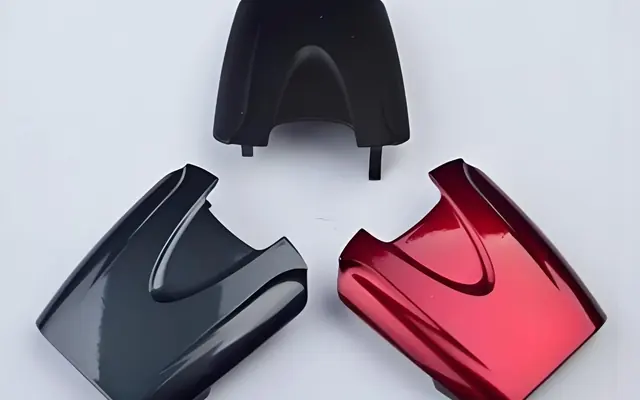 Gloss-painted injection molded plastic housings