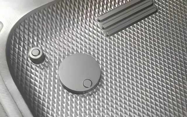 Textured injection molded plastic surface samples
