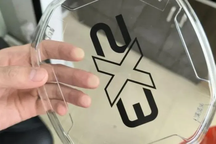 Fine logo printed onto a clear molded part