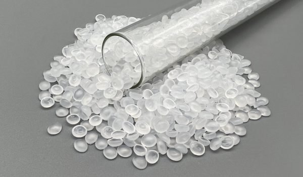 A pile of translucent UHMW pellets